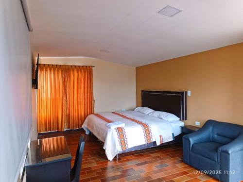 Ένα ή περισσότερα κρεβάτια σε δωμάτιο στο Hotel y Cabañas Rio Mayo