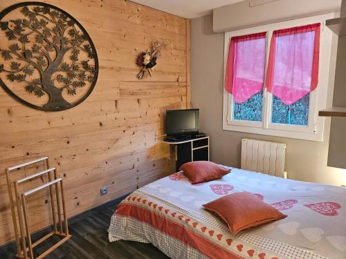 Postel nebo postele na pokoji v ubytování Chez Corinne