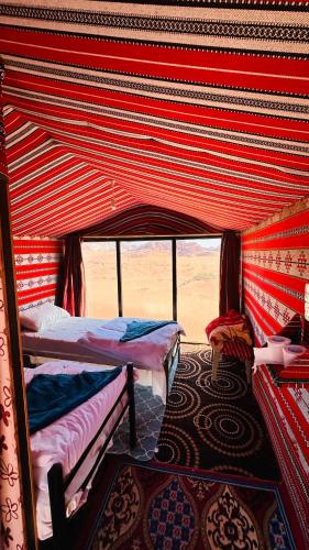 Lova arba lovos apgyvendinimo įstaigoje Desert Nights camp