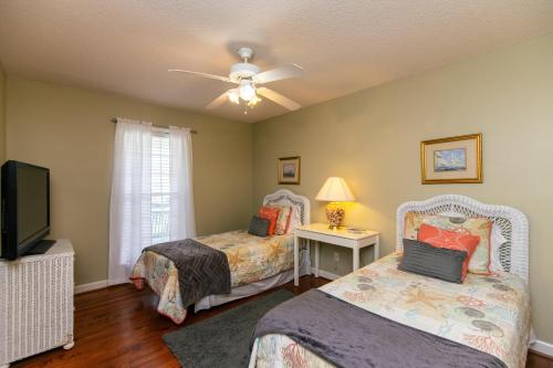 En eller flere senge i et værelse på Dawhoo Dreams