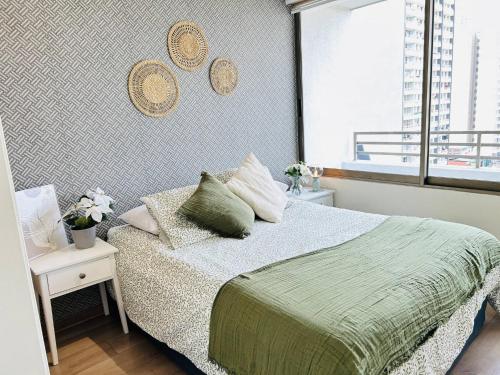 Un pat sau paturi într-o cameră la 2D 2B, hasta 4 personas, Vista cordillera, Parking, AC & Calefacción