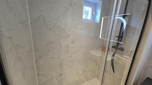 Ένα μπάνιο στο L'ALPETTE maison 3 pièces 2 chambres