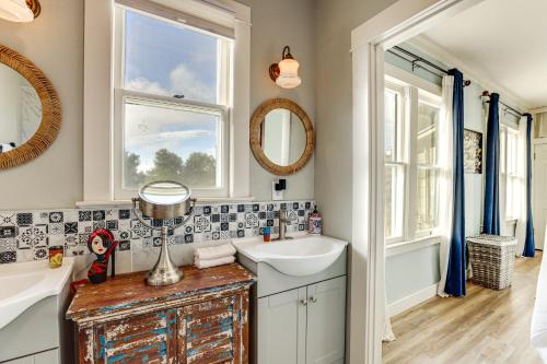 a bathroom with a sink and a tub and a mirror at 28 Acres in Wine Country! Central California Oasis in Estrella