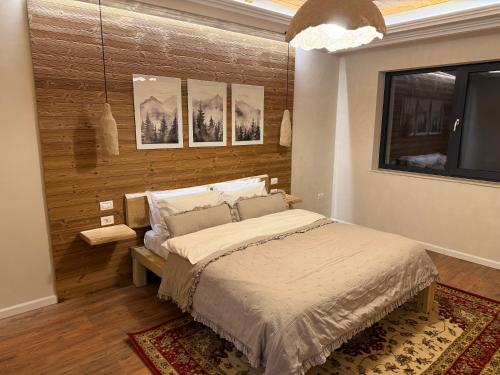 Postel nebo postele na pokoji v ubytování Chalet Village