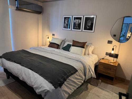 Ένα ή περισσότερα κρεβάτια σε δωμάτιο στο Modern 1BR by Parque Bustamante, Providencia