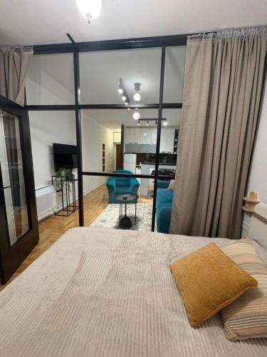 Ένα ή περισσότερα κρεβάτια σε δωμάτιο στο Apartment Central park