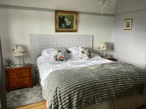 Ένα ή περισσότερα κρεβάτια σε δωμάτιο στο Fortuna views farm stay