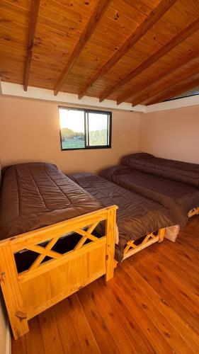 Posezení v ubytování Cabaña moderna frente al lago cerca de la playa