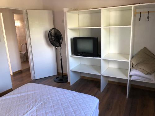 Postel nebo postele na pokoji v ubytování Duplex 101 Parque Necochea