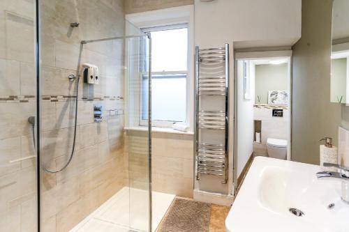 Phòng tắm tại The Roman Kove Apartment Bath