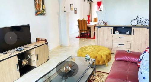 TV a/nebo společenská místnost v ubytování Katra Lodging