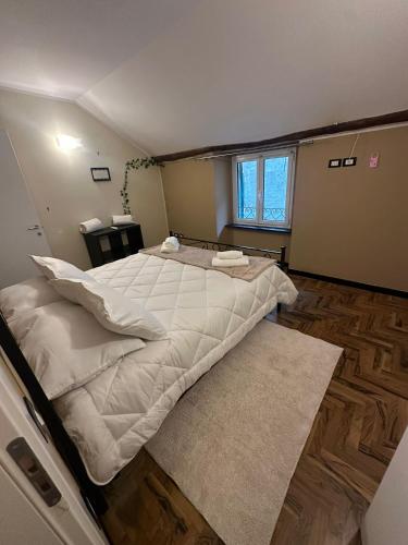 Giường trong phòng chung tại Casa Olivo