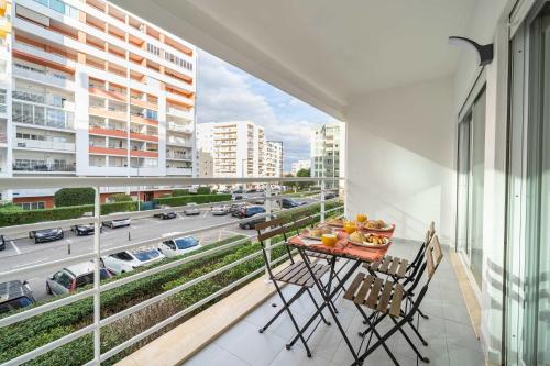 Bright Flat with Pool & Balcony by HostWise