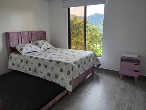 Voodi või voodid majutusasutuse Hospedaje la esperanza toas