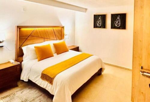 Ένα ή περισσότερα κρεβάτια σε δωμάτιο στο Hotel Casa KARLOTTA