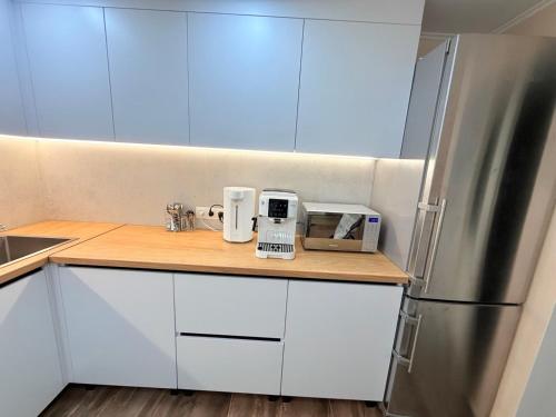 Kuchyň nebo kuchyňský kout v ubytování Хостел с кабинками в центре CABIN HOSTEL city center