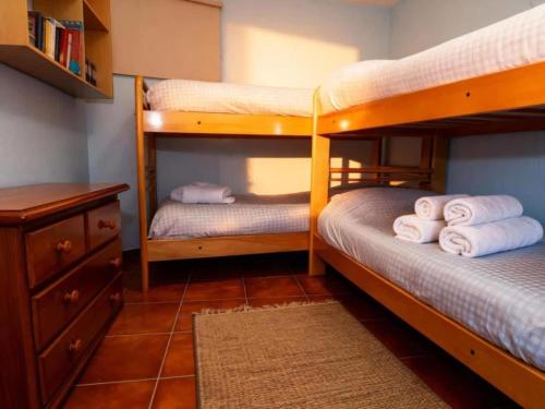 Una cama o camas en una habitación de Mont Blanc Sierra Nevada Zona Baja 8 Pax A 2 Min del Telesilla y Bares