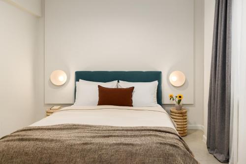 Ένα ή περισσότερα κρεβάτια σε δωμάτιο στο Downtown Deluxe Apartment on Tsimiski - By Nuvia Domus