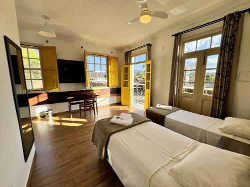 Et tv og/eller underholdning på Imperial Cidade Smart Suítes