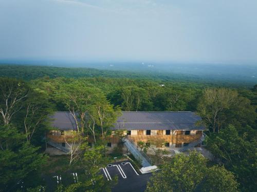 an overhead view of a house in the middle of a forest at SANU 2nd Home Nasu 3rd in Nasu