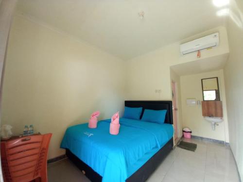 Ένα ή περισσότερα κρεβάτια σε δωμάτιο στο Stella Dell Mare Homestay and Tour