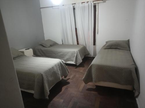 Ένα ή περισσότερα κρεβάτια σε δωμάτιο στο Casa amplia en Mogotes EL isa