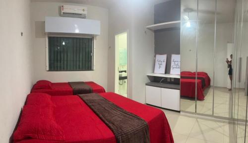 Una cama o camas en una habitación de Casa com piscina no Aracagy 2 km da praia