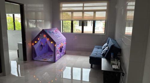 Ένα ή περισσότερα κρεβάτια σε δωμάτιο στο Chun Zhi Yen Homestay