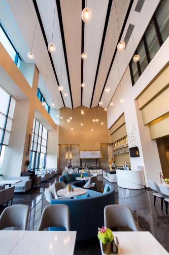 Et opholdsområde på Huizhou Faithland Atin Hotel