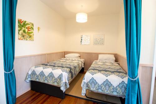 Llit o llits en una habitació de Leigh Central