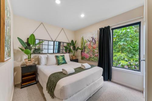 Ένα ή περισσότερα κρεβάτια σε δωμάτιο στο The Pier Taupo