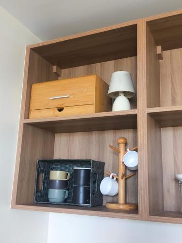 Η κουζίνα ή μικρή κουζίνα στο BH UrbanSky Condo