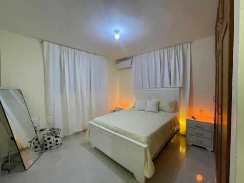 Ένα ή περισσότερα κρεβάτια σε δωμάτιο στο Modern 3-bedroom apartment in a gated residential community