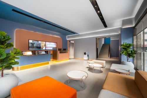 Χώρος καθιστικού στο Hanting Hotel Shenzhen Guanlan Foxconn