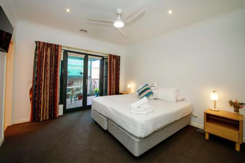 Ένα ή περισσότερα κρεβάτια σε δωμάτιο στο Waterfront Haven