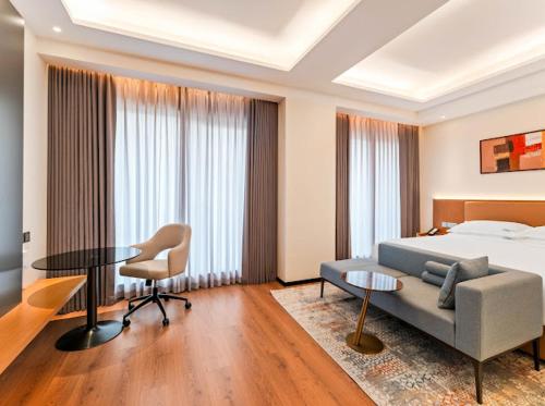 Χώρος καθιστικού στο Bamus Sarovar Portico Kampala