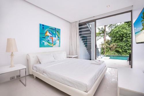Кровать или кровати в номере Private 3-Storey Pool Villa Atika 10, for 7, views of Patong Bay