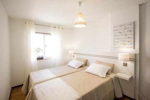 Krevet ili kreveti u jedinici u okviru objekta Spacious Apartment in Lisbon