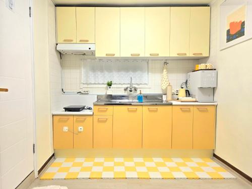 Kuchyň nebo kuchyňský kout v ubytování BADA Stay