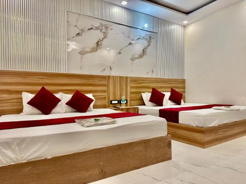 Postel nebo postele na pokoji v ubytování Hotel Krishna Kripa Palace