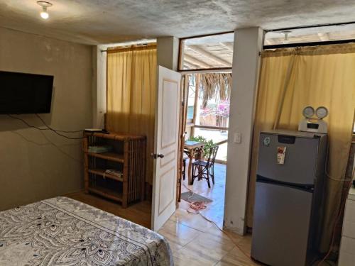 Ένα ή περισσότερα κρεβάτια σε δωμάτιο στο Villa Naylamp loft 10 beach pocitas