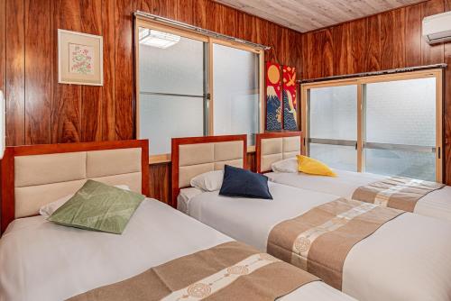 Voodi või voodid majutusasutuse Sky Tree Stay Hotel 5 8-minute walk from Yahiro Station 3-minute train ride to Tokyo Skytree Station toas