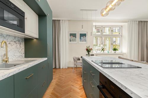 Köök või kööginurk majutusasutuses APARTMAN VibePoint Ostrava