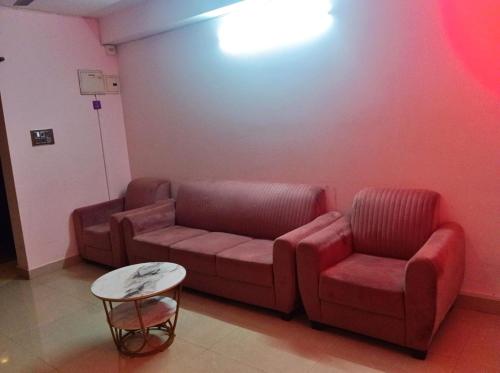 Mohtisham Oasis Apartmentにあるシーティングエリア