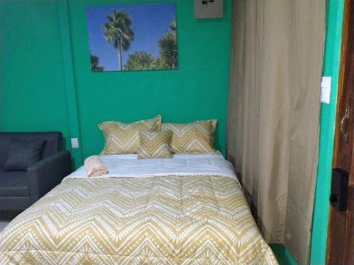 Postel nebo postele na pokoji v ubytování La Fortuna Brisas del Recuerdo