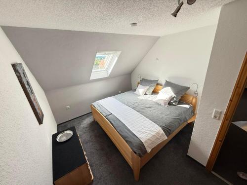 Ένα ή περισσότερα κρεβάτια σε δωμάτιο στο Ferienwohnung HAWELA