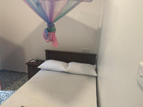 Ένα ή περισσότερα κρεβάτια σε δωμάτιο στο The blue sky