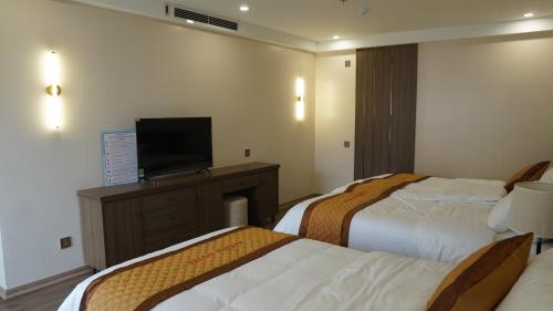 TV a/nebo společenská místnost v ubytování Marina Hotel Lạng Sơn