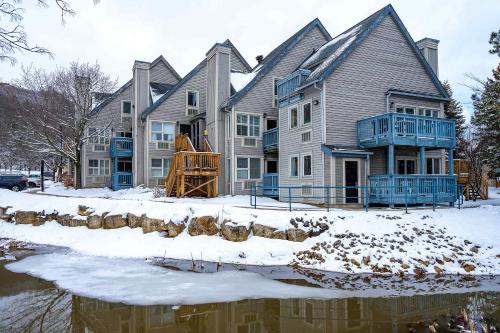 a group of houses with snow on the ground at Mountain View Ski-In-Out Pool Shuttle to Blue in Blue Mountains