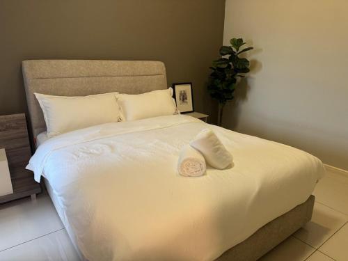 Postel nebo postele na pokoji v ubytování Elysia Park Legoland Iskandar